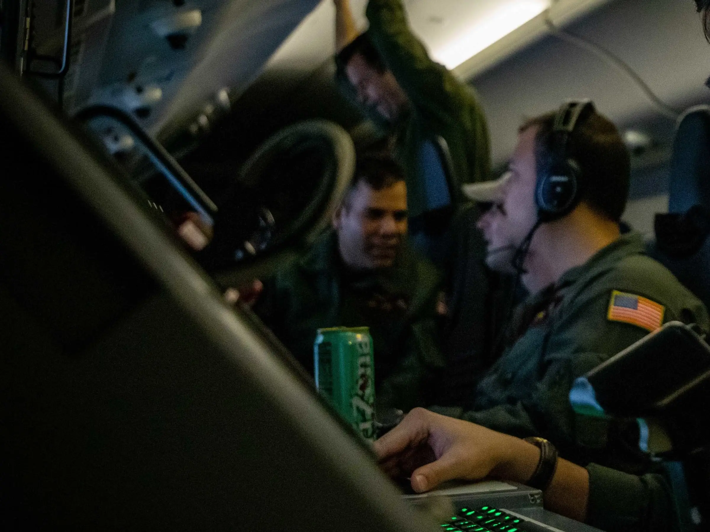 A mission operator station in an ISR aircraft cabin in flight