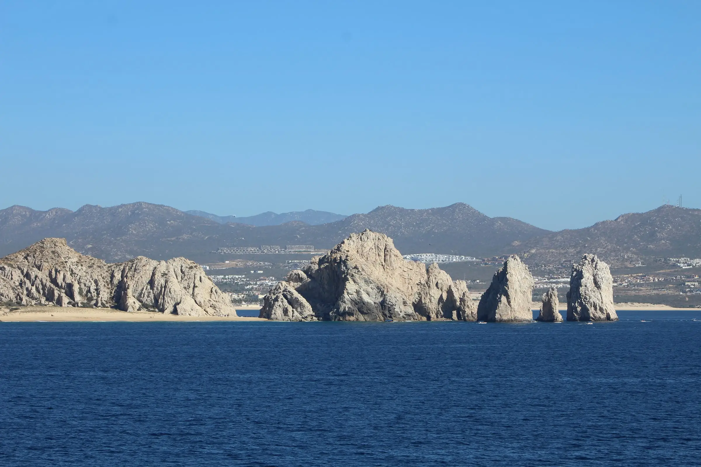 Rock stacks at the end of a peninsula where two bodies of water meet